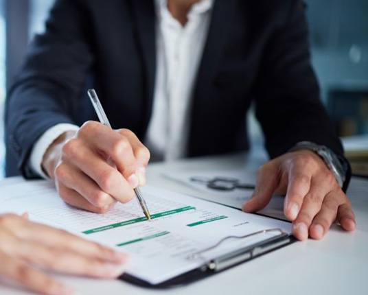 People go over paperwork