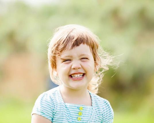 Child smiles
