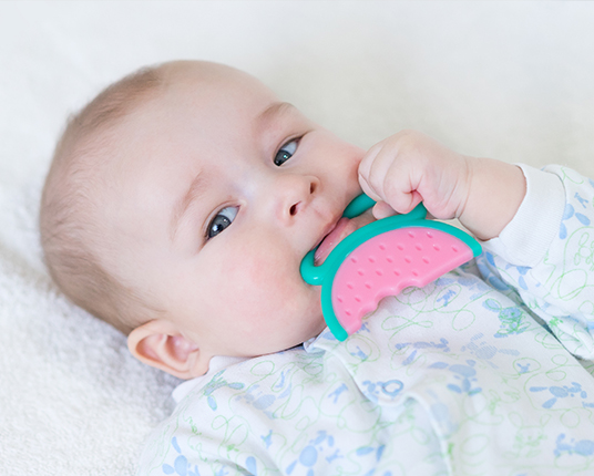 Child using a teething ring