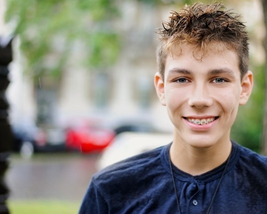 Teen with traditional braces