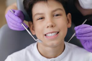 Teen smiling at his checkup